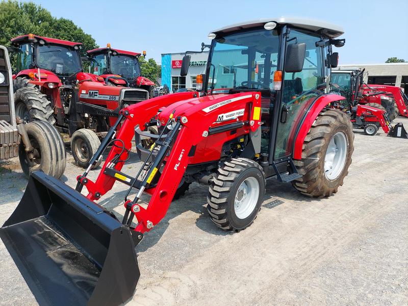 Tractors  Massey Ferguson MF1840MH with Cab and Loader Photo